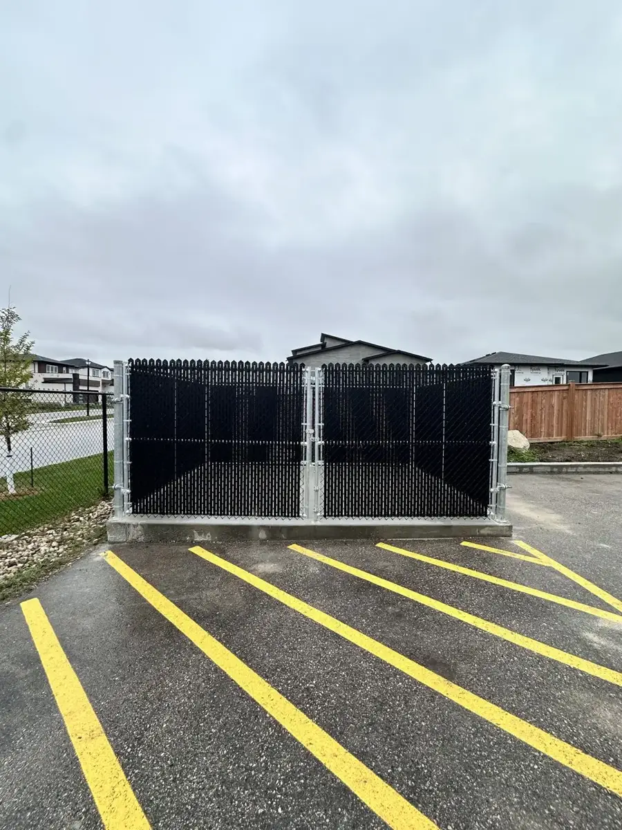 Double chain link drive gate with a square welded frame and privacy inserts