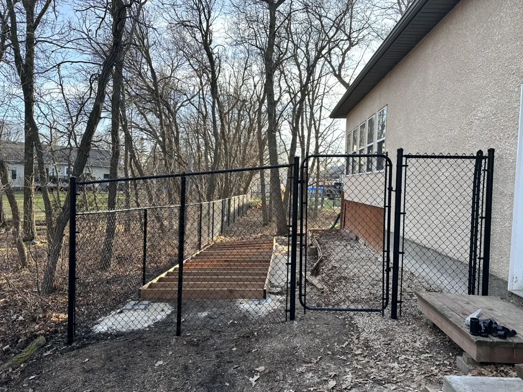 Black chain link on sloping grade