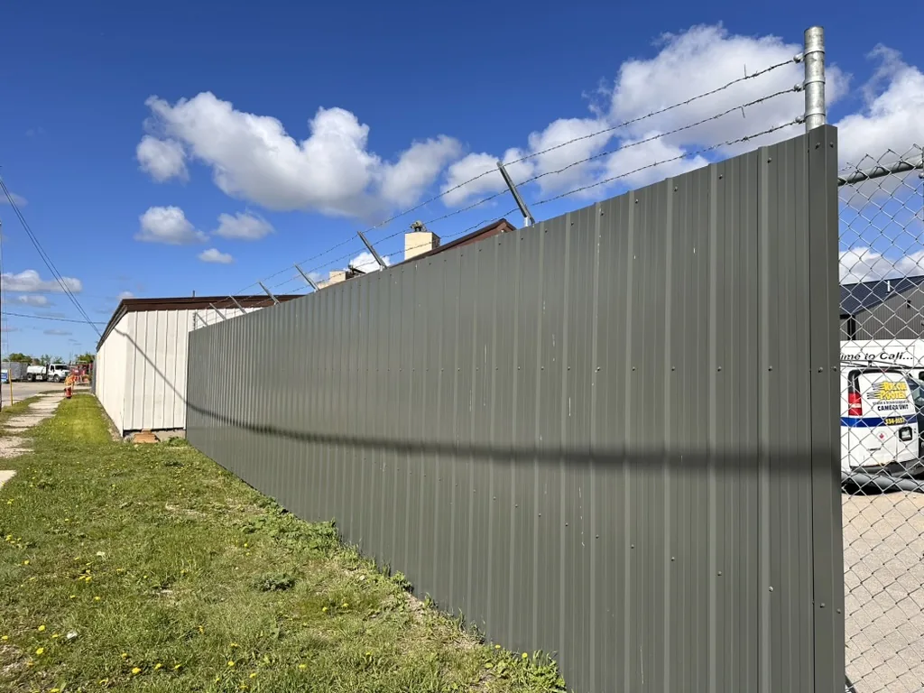 Sheet metal security fencing