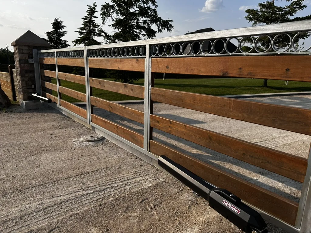 Cedar and metal fence with decorative scrollwork