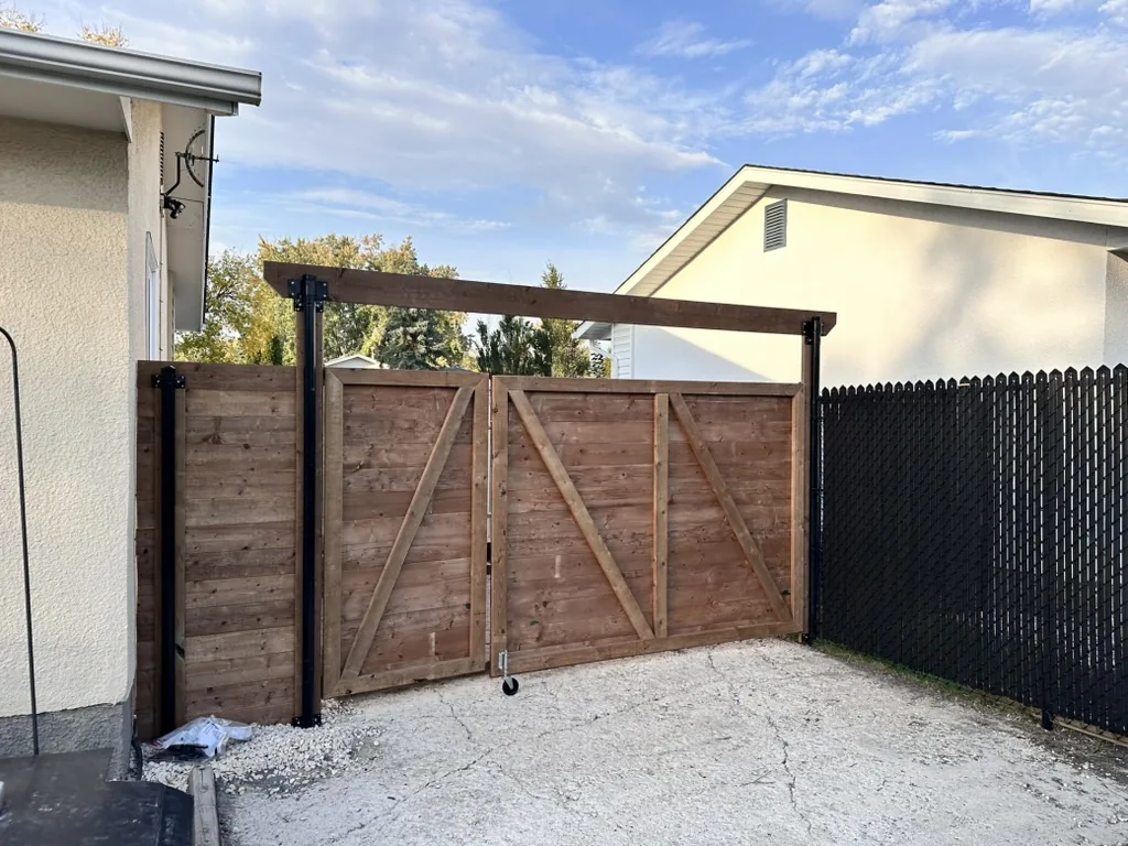 Board-on-board privacy fence with double gate